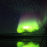 aurora borealis reflection on the lake Yellowknife VacationsJPG